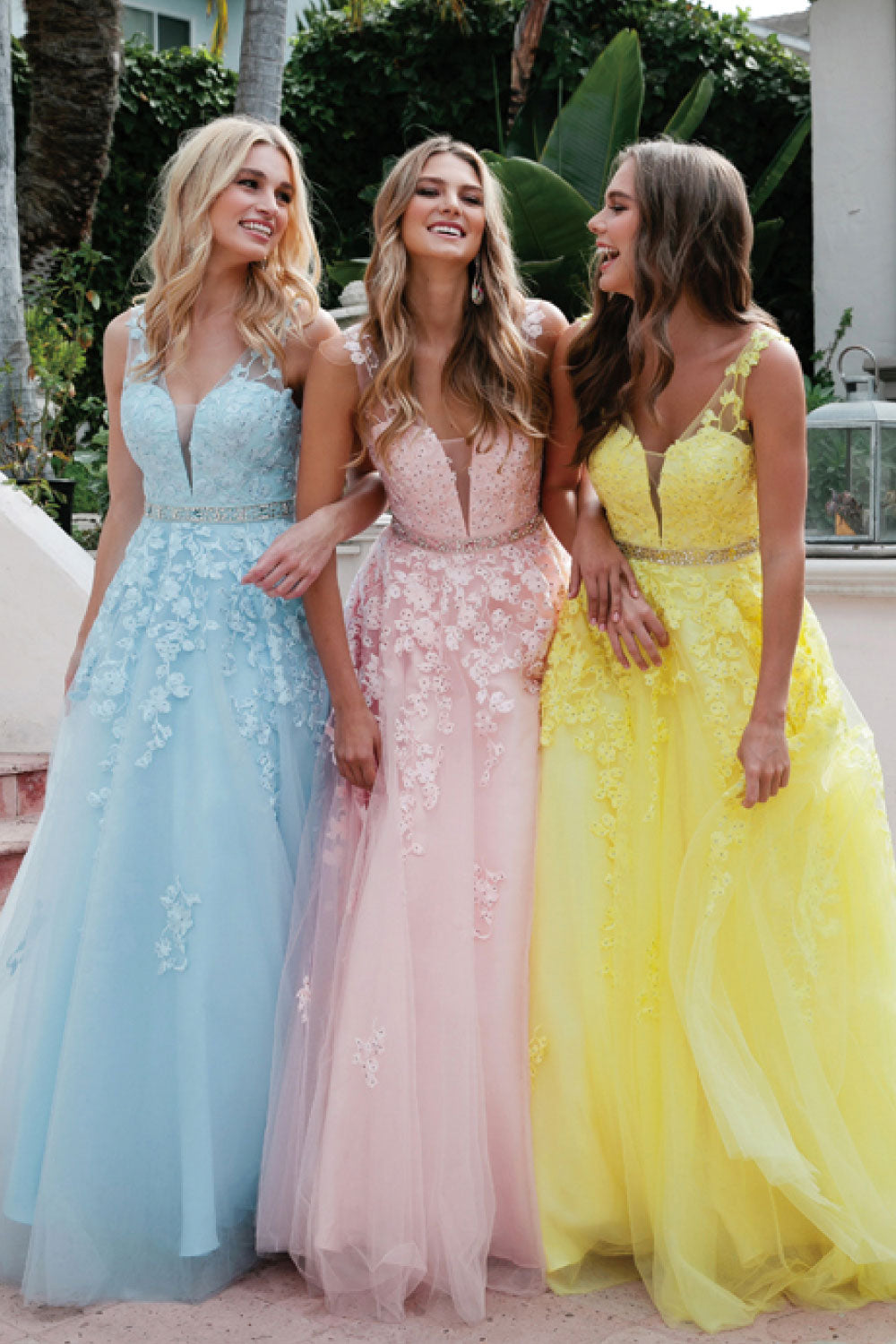 Image of Juliet's Floral Appliqué Tulle Gowns on models.
