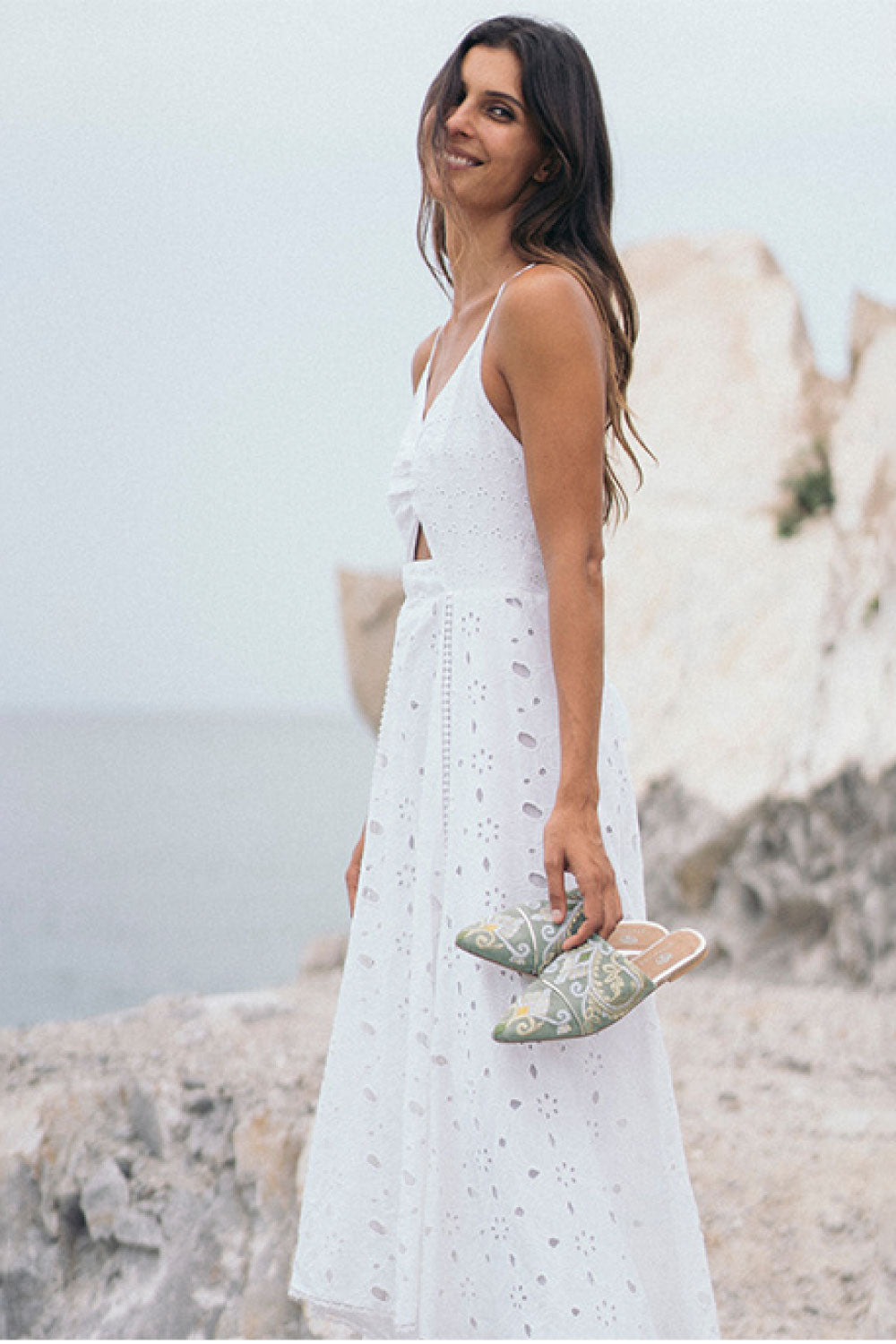 Image of the Filomena Dress, in White, on a model.
