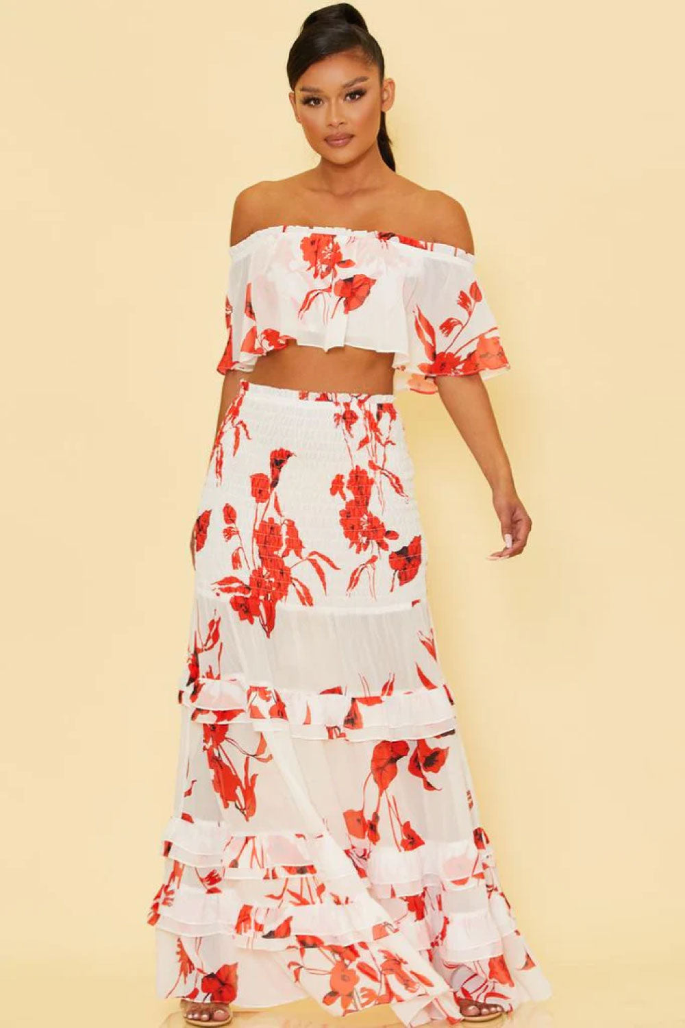 Image of front of Luxxel's Red Floral Two-Piece Skirt Set on a model.