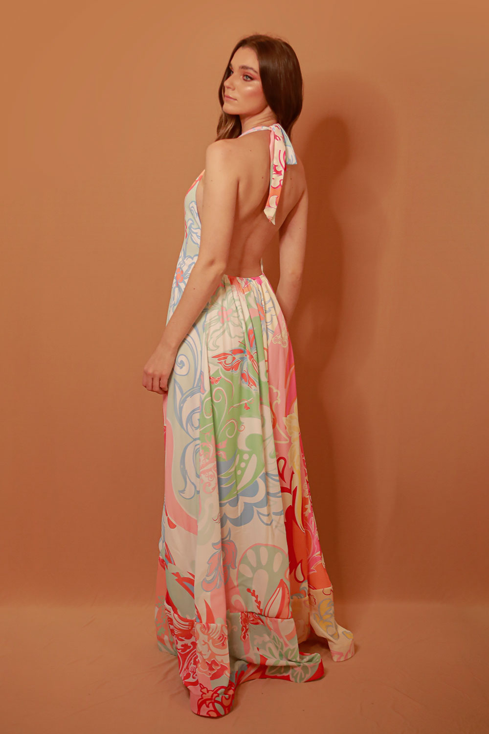 Image of the back of Liliana Meza's Claire Dress on a model.