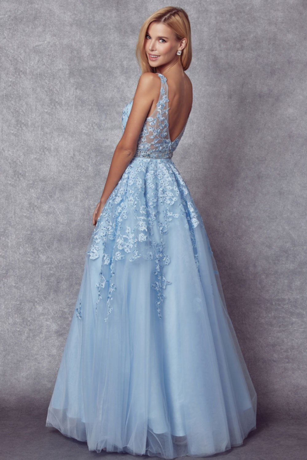 Image of the back of Juliet's Floral Appliqué Tulle Gown, in Baby Blue, on a model.