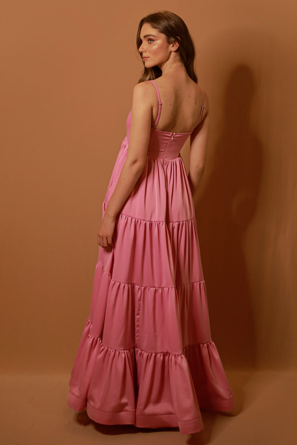 Image of the back of Liliana Meza's Gemma Dress in Pink on a model.