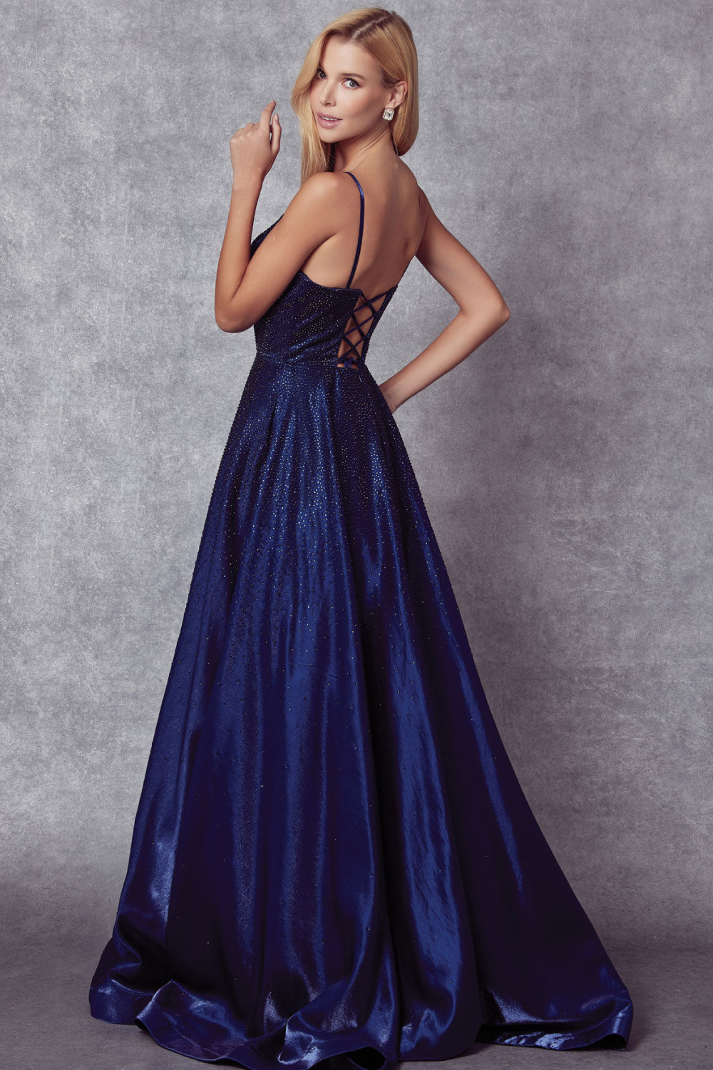 Image of the back of Juliet's Long Sparkly Gown in Blue on a model.