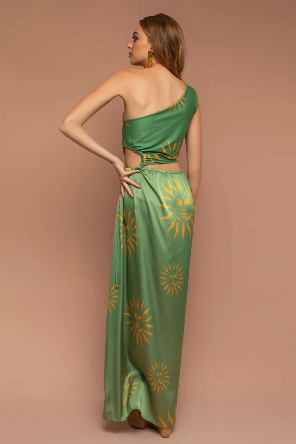 Image of the back of Mar A Mar's Sole Dress in Green on a model.