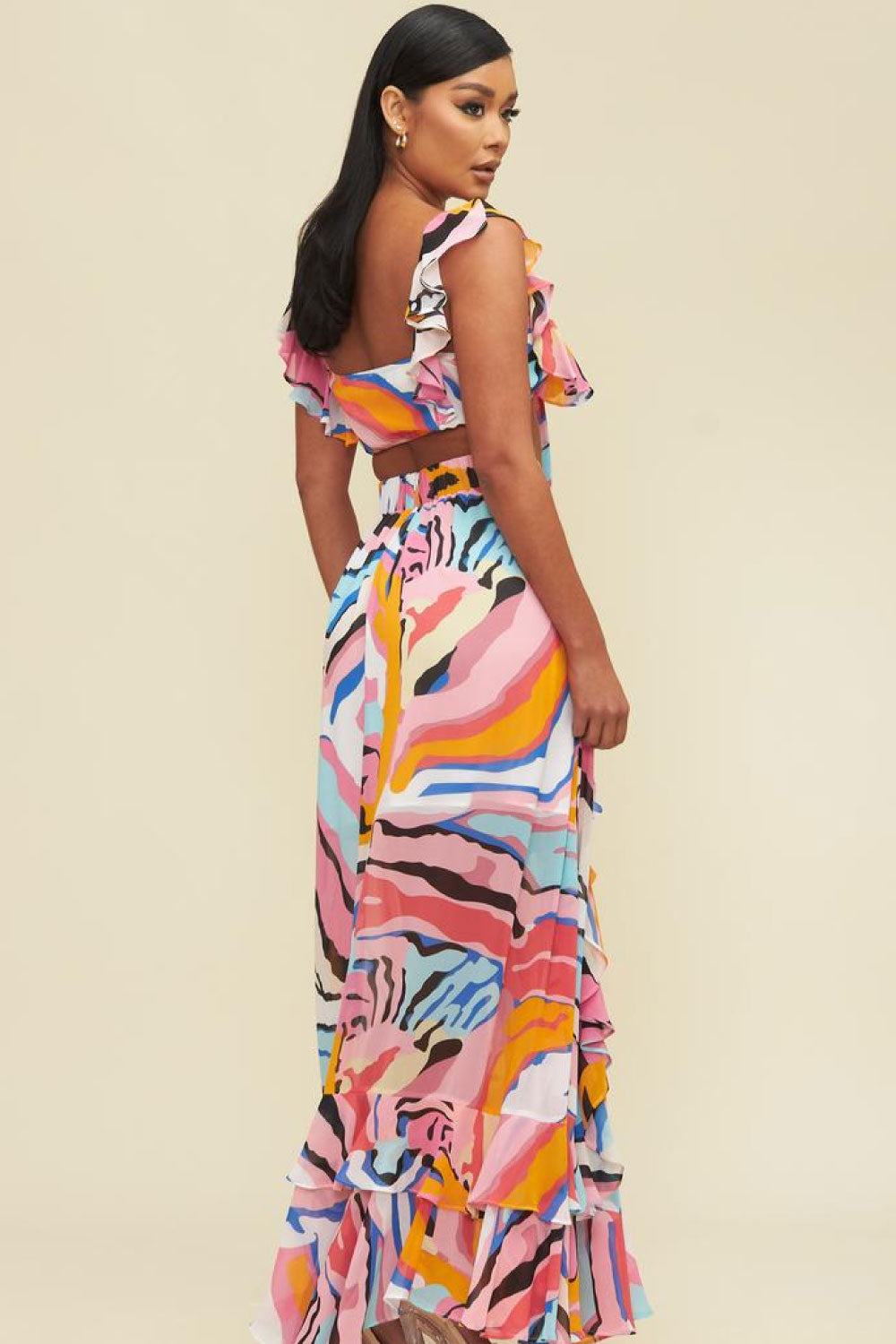 Image of the back of the Dreaming of Tropic Two Piece Set on a model.