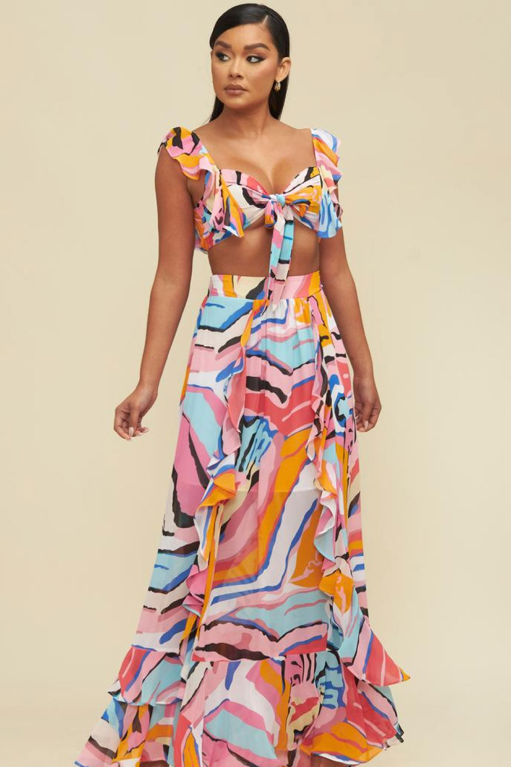 Image of the front of the Dreaming of Tropic Two Piece Set on a model.
