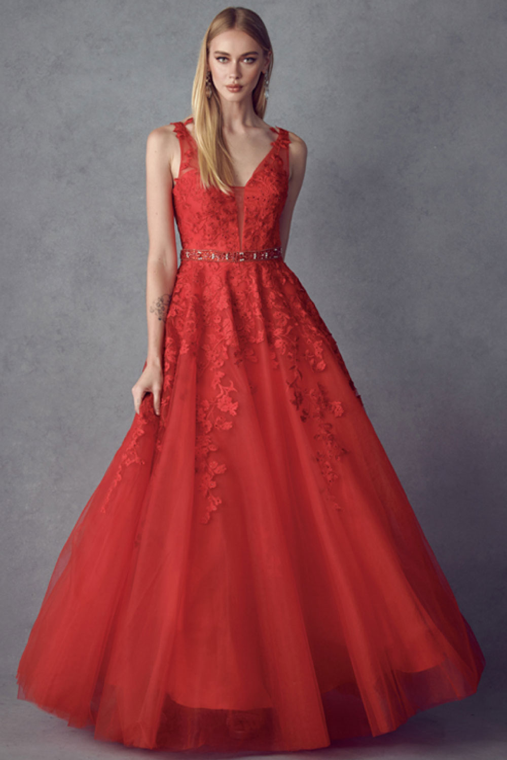 Image of the front of Juliet's Floral Appliqué Tulle Gown, in Red, on a model.