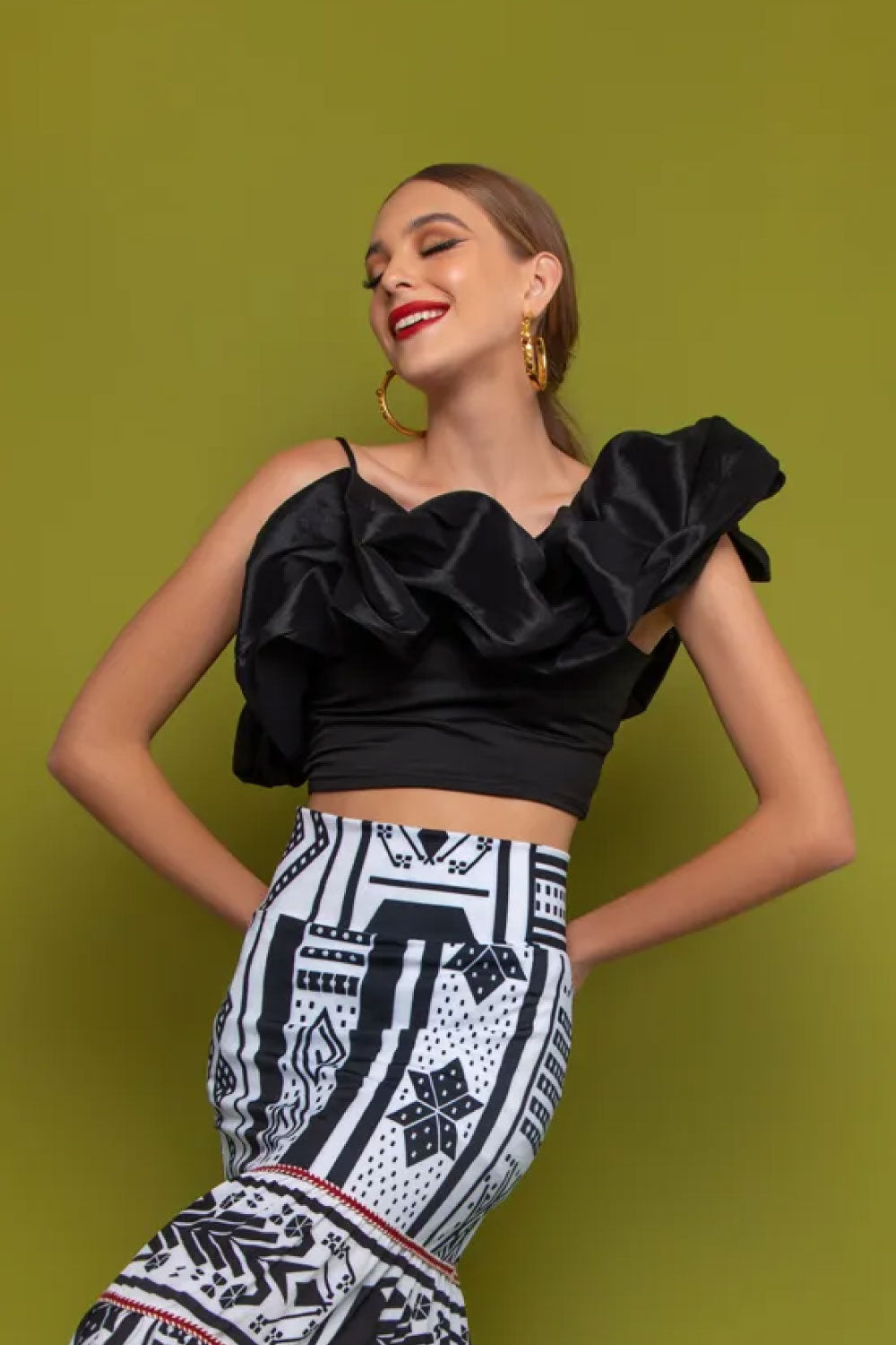 Image of the front of Mar A Mar's Notte Top in Black on a model.