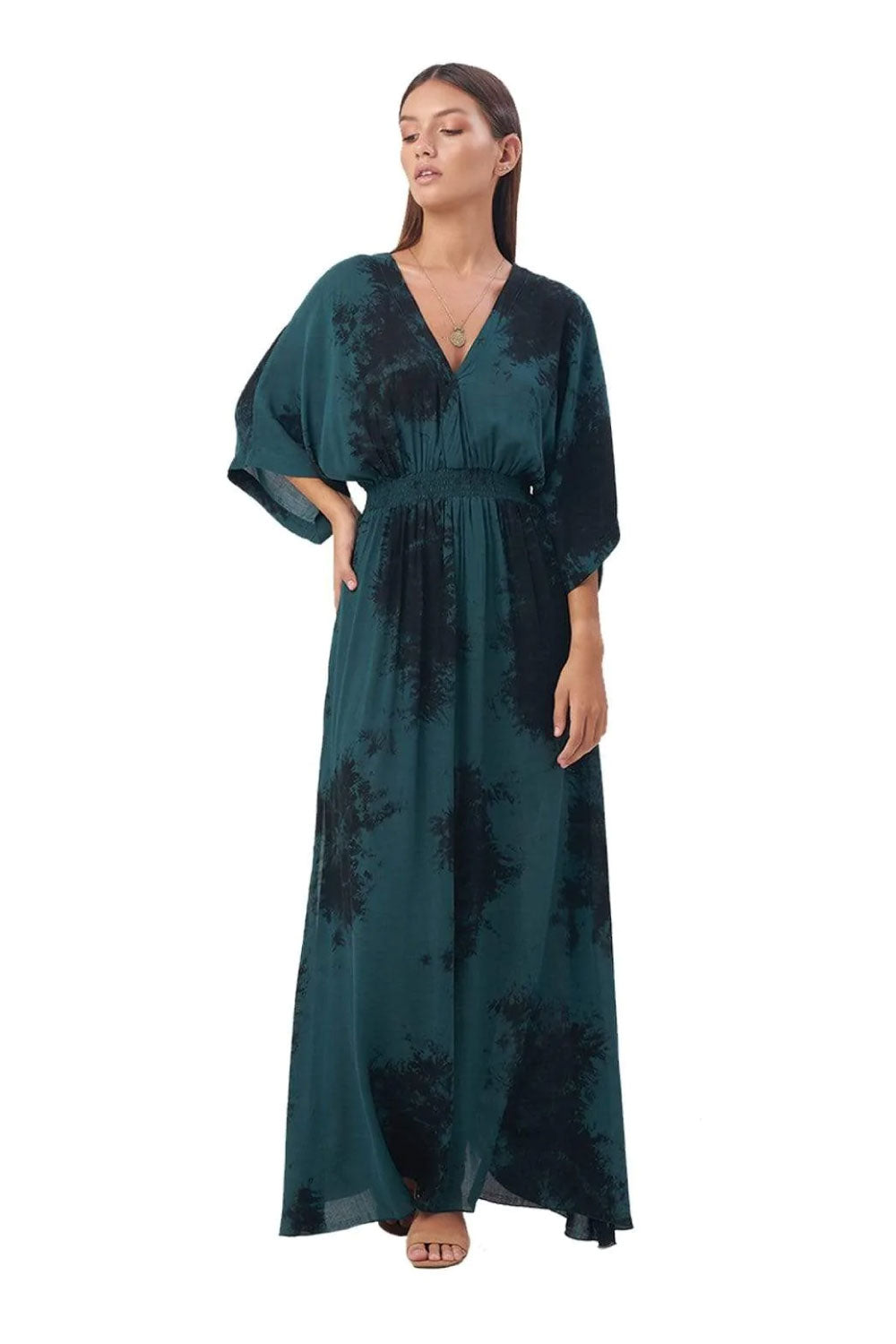 Image of the front of Khush Clothing's Poppy Caftan Maxi Dress in Midnight Green on a model.