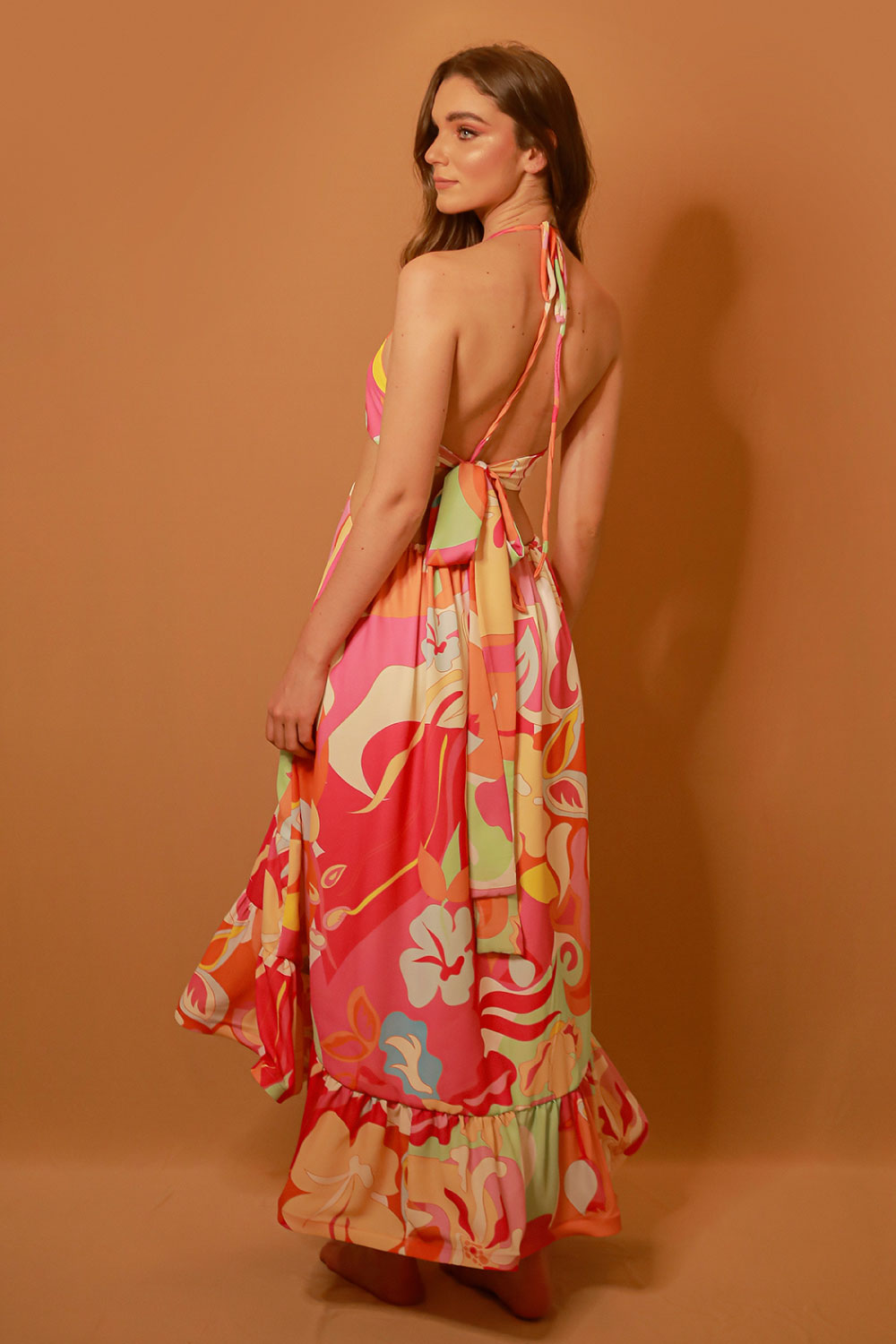 Image of the back of Liliana Meza's Julia Dress on a model.