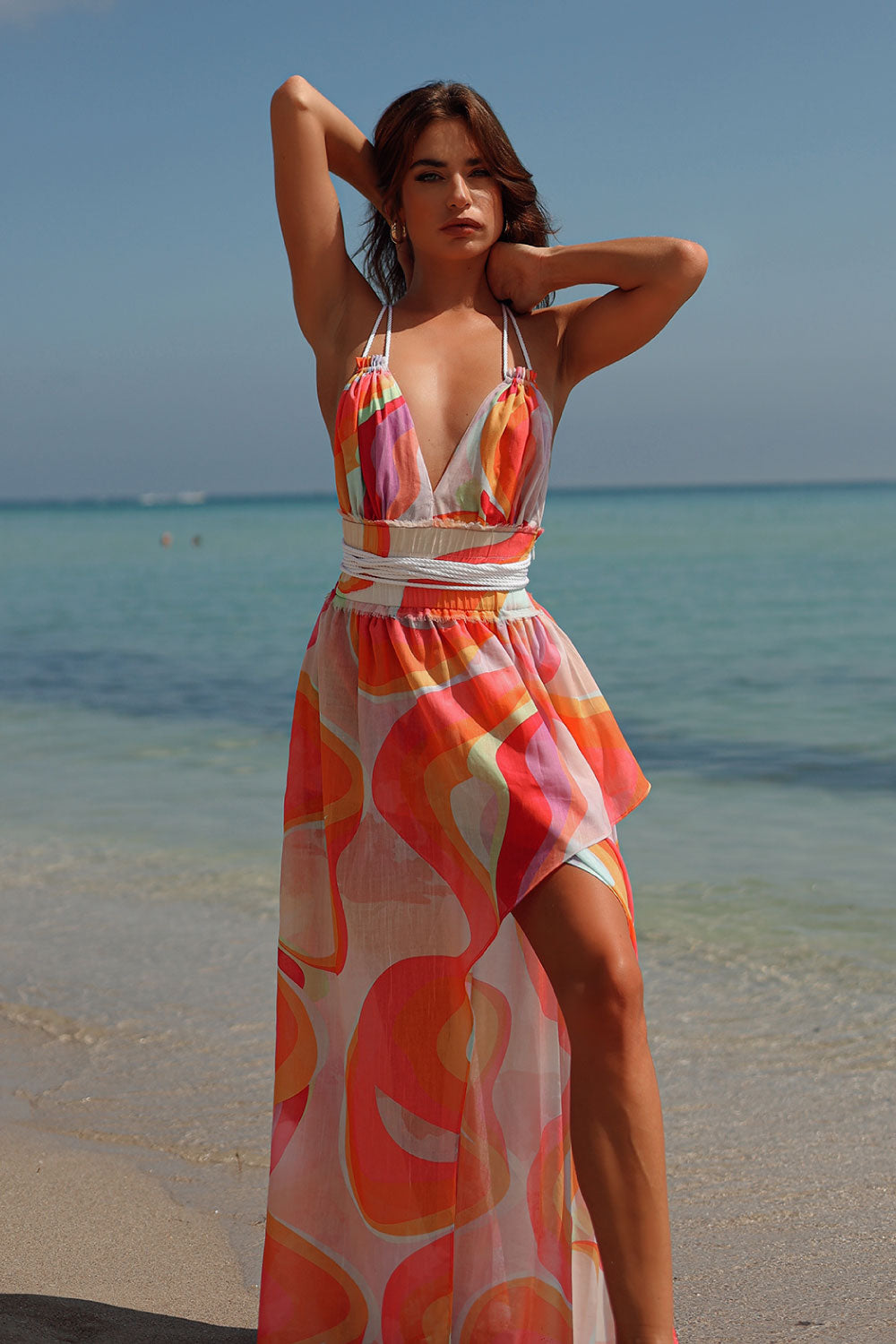 Image of the front of Liliana Meza's Magic Sunset Wynn Dress on a model.