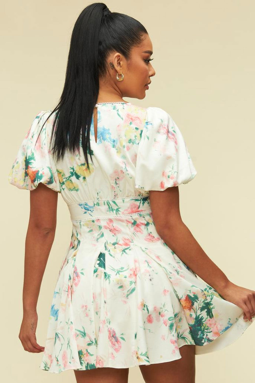 Image of the back of the Spring Dream Dress on a model.