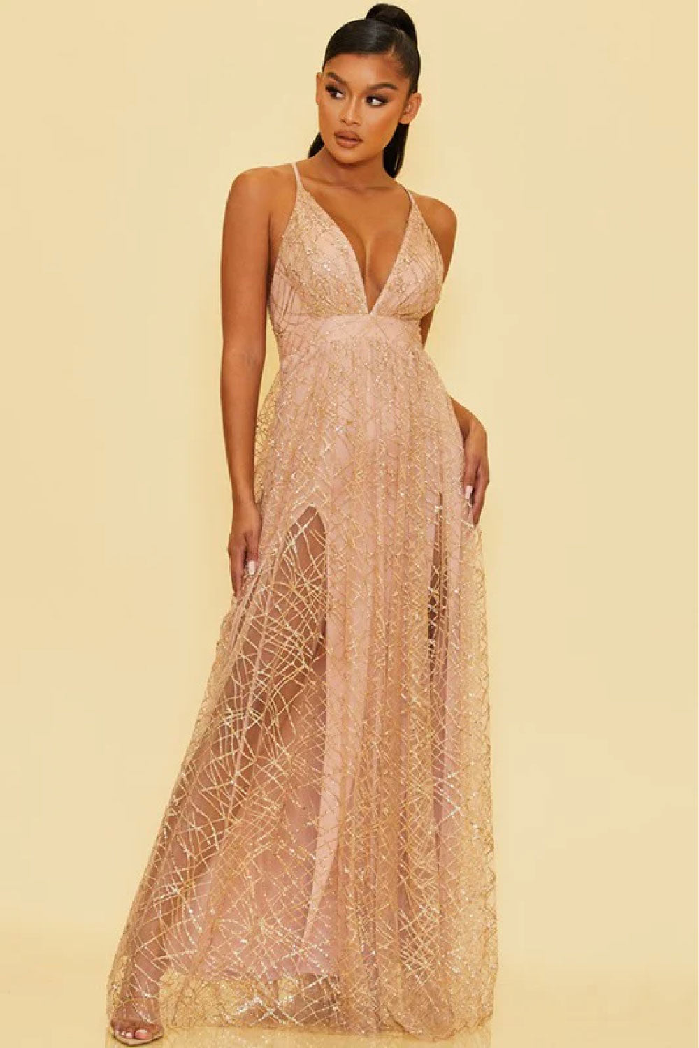 Image of the front of Luxxel's Glitter Layered Deep V-Neck Gown in Rose Gold on a model.