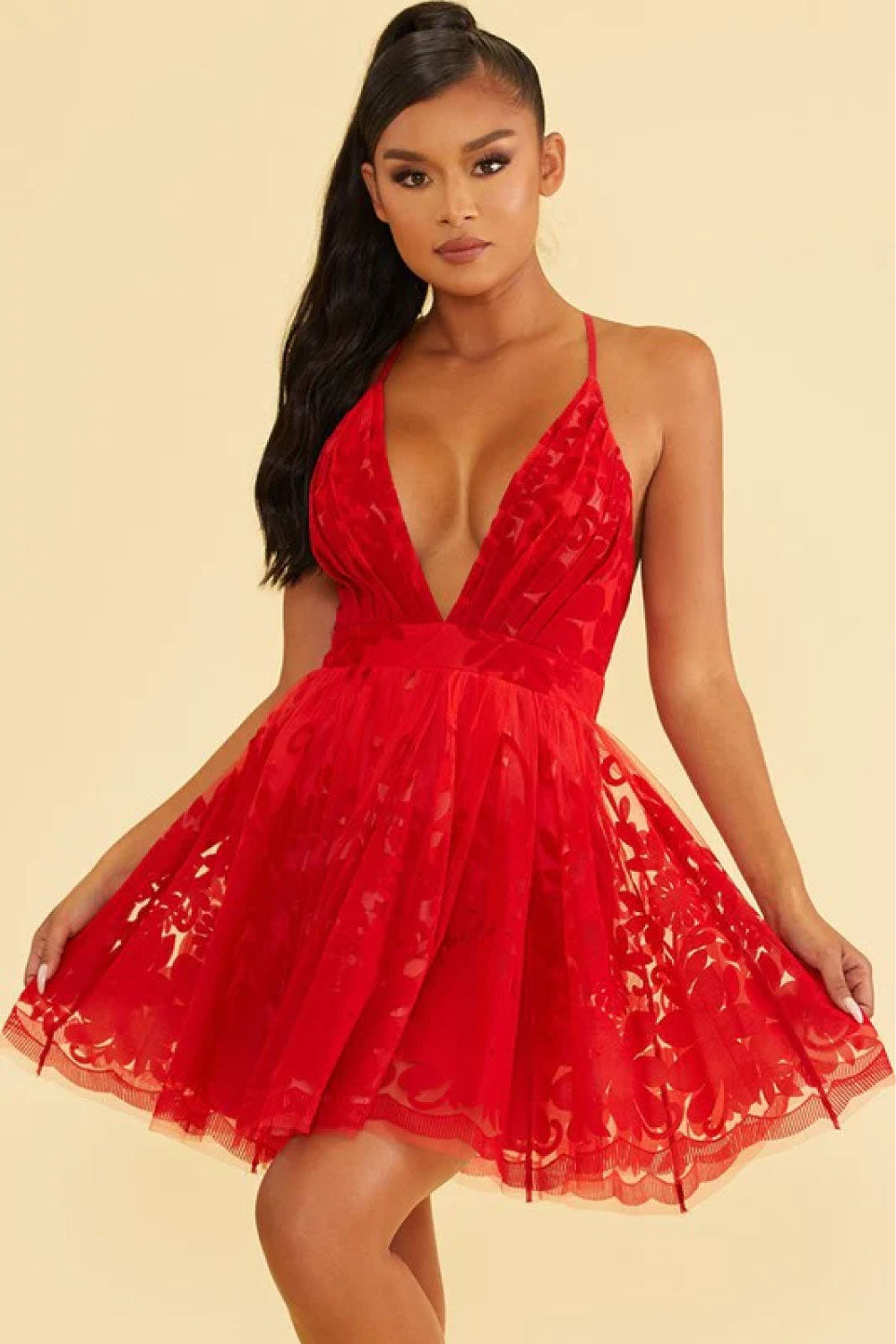 Image of the front of Luxxel's Elegant Lace Mini Dress in Red on a model.