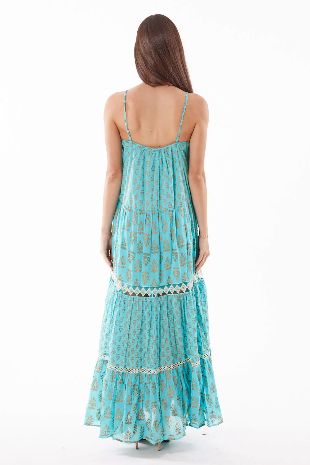 Image of the back of Ranee's Lurex Dress in Aqua on a model.