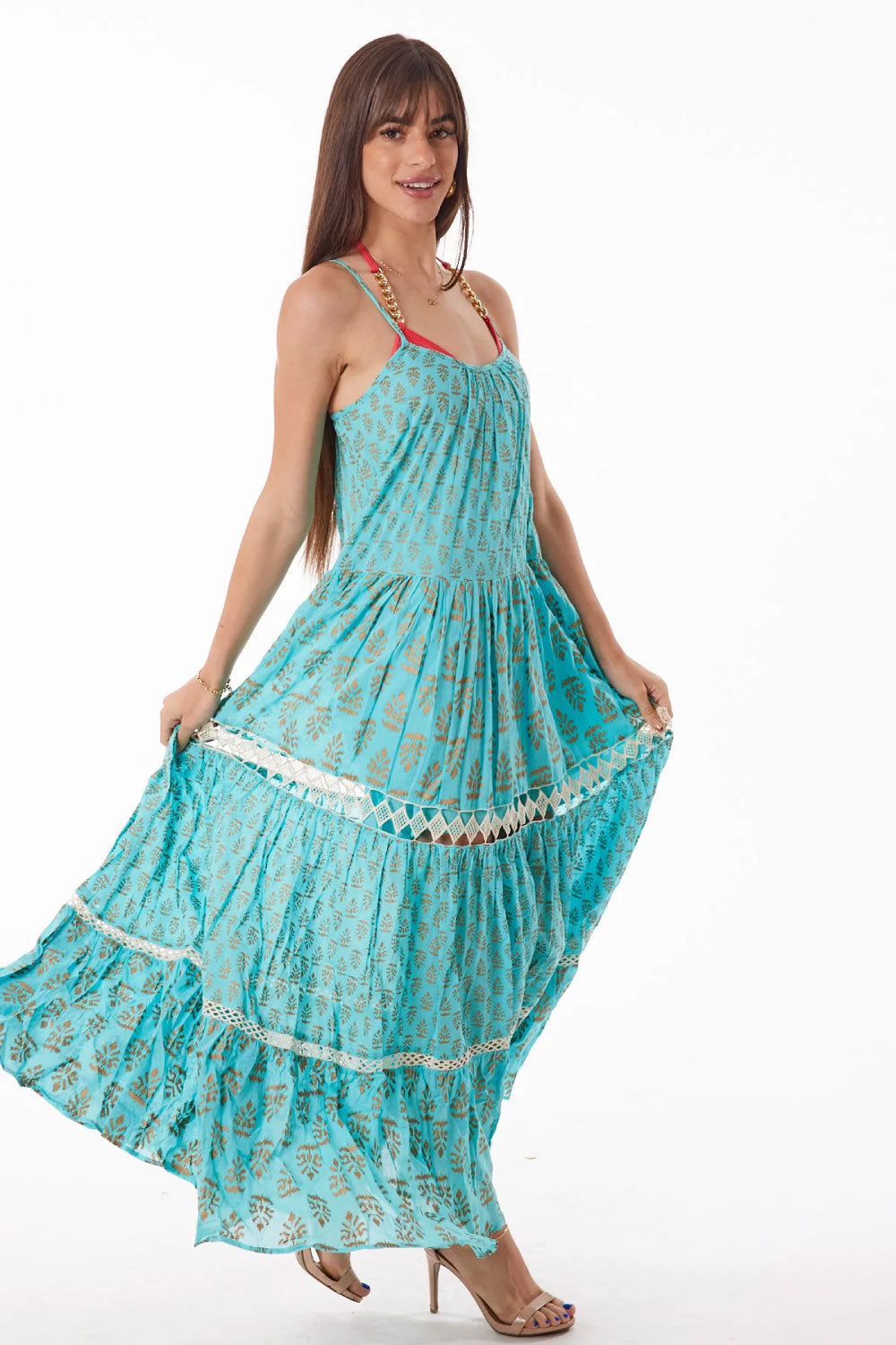 Image of the front of Ranee's Lurex Dress in Aqua on a model.