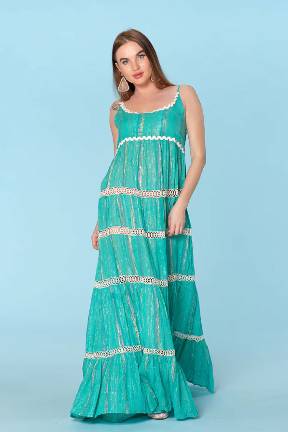 Image of the front of Ranee's Sexy Holiday Dress in Turquoise on a model.